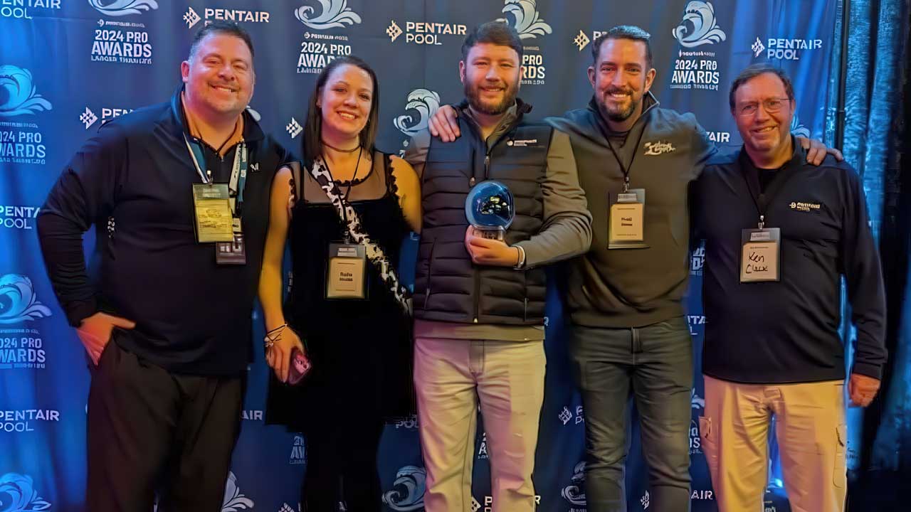 Keith Smith (Center) this year's winner of the Pentair Pool Pro Award