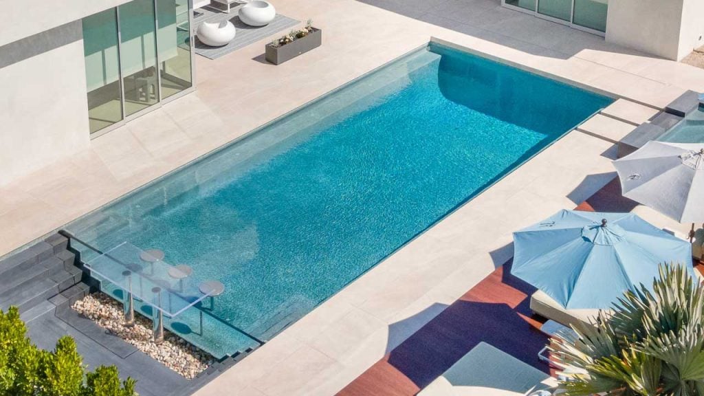 Acrylic wall pool designed by Melo's Pools & Outdoors