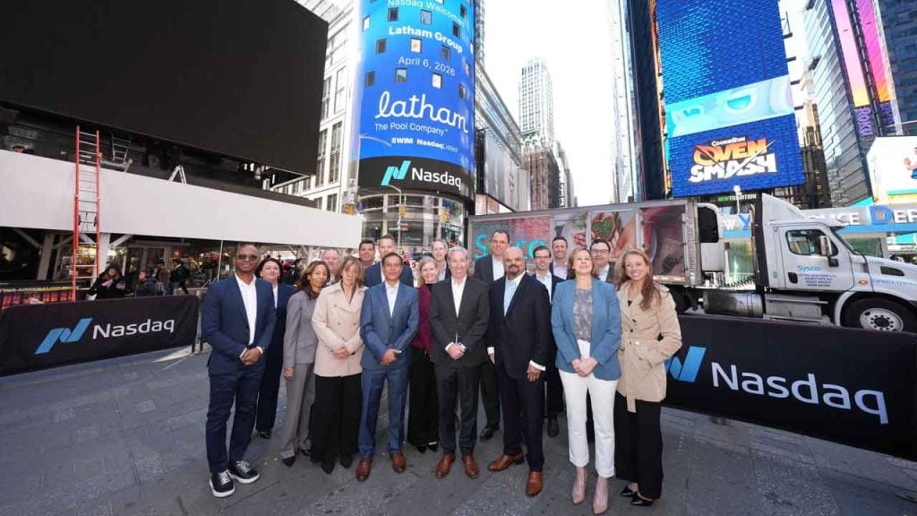 Latham got to ring the Opening Bell at Nasdaq - shown celebrating the moment at Nasdaq MarketSite in Times Square